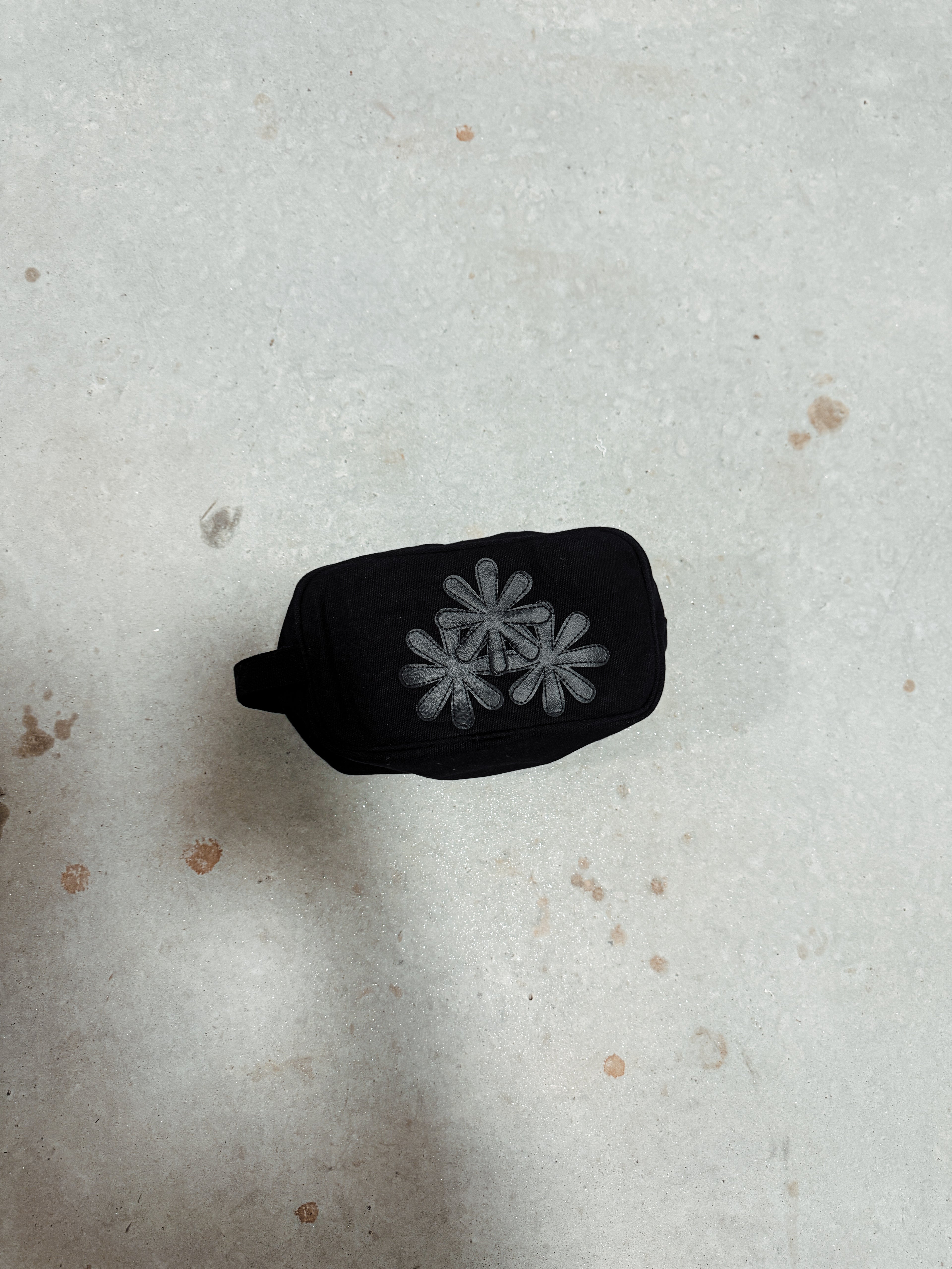 Black Petals Toiletry Bag